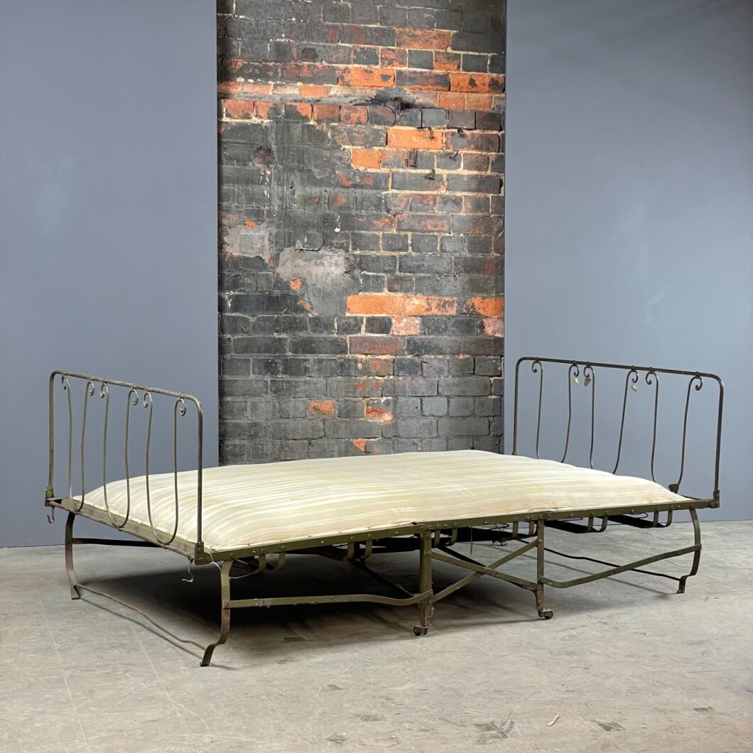 Folding iron bed online deals