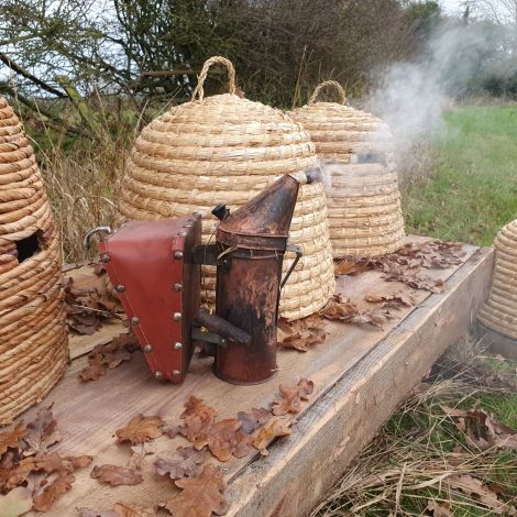 Bee Skeps - www.BrandonThatchers.co.uk Straw Bee Skeps x6, Skep Table,  Bee Skep Bases x2 and Bee Smoker - RENTAL ONLY