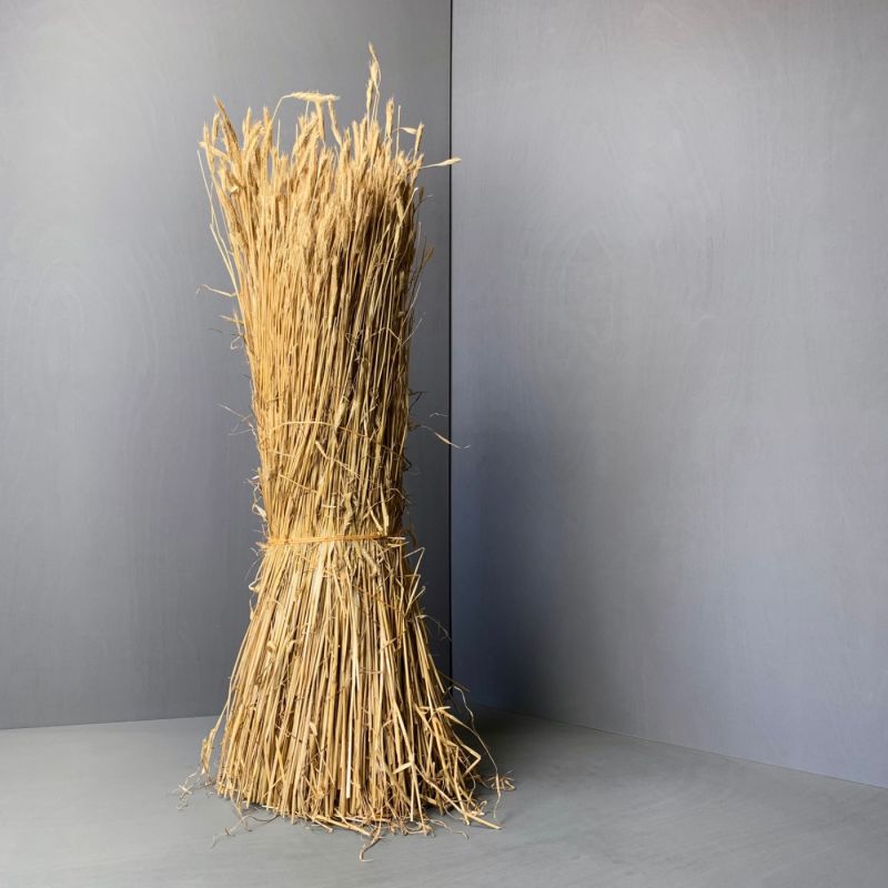 Straw Bundle, approx. 1.2 m tall by 40 cm diameter.