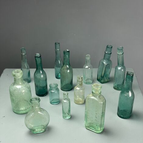 Assorted Aqua Glass Bottles - RENTAL ONLY