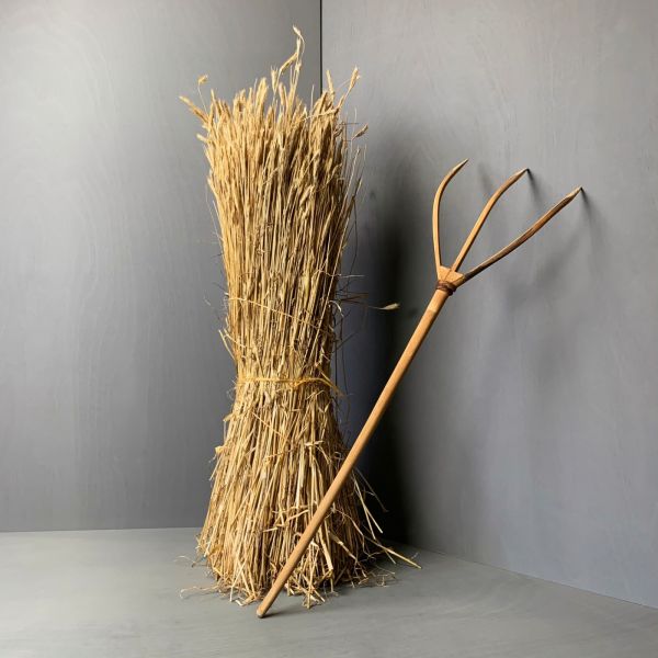 Straw Bundle, approx. 1.2 m tall by 40 cm diameter.